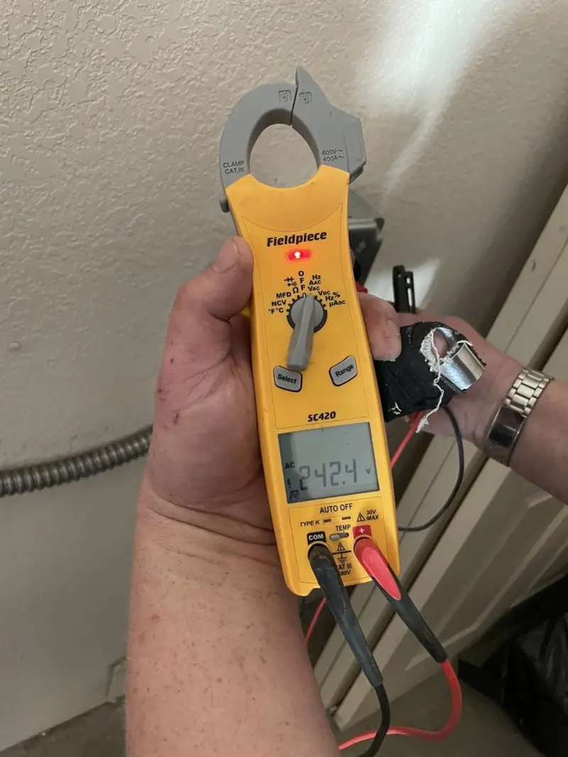 Voltage testing with clamp meter during Generator Installation in North Syracuse
